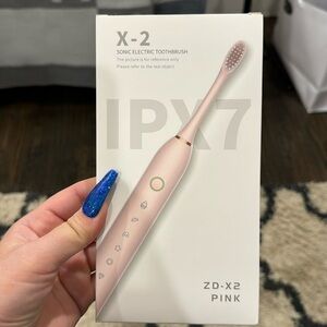 Pink electric toothbrush NEW*